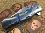 Kizer Dorado skully, Titanium Flipper